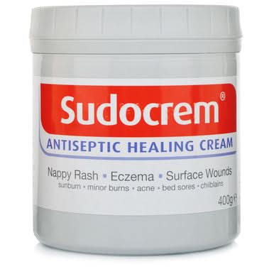 Sudocrem antiseptic healing cream jar on a white background