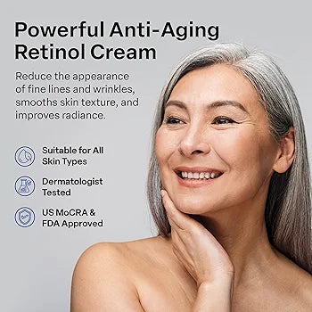 Woman with gray hair and a smile, promoting a powerful anti-aging retinol cream.
