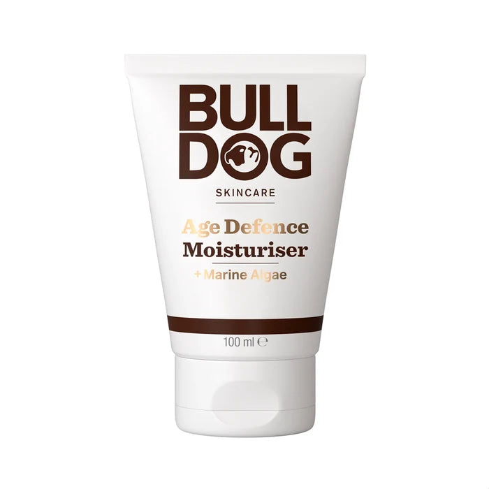 A 100ml tube of Age Defence Moisturiser for men, with a white background and bold brown and gold text on the packaging. Made from natural origin ingredients for effective anti-ageing care.
