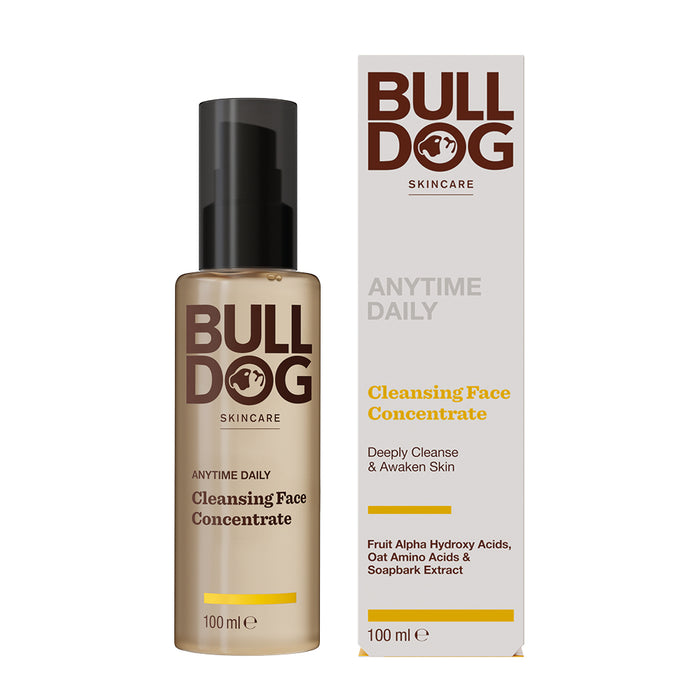 A 100ml bottle and box of Anytime Daily Cleansing Face Concentrate, in tan and white packaging with brown lettering, featuring natural origin ingredients like fruit alpha hydroxy acids, amino acids, and soapbark extract.