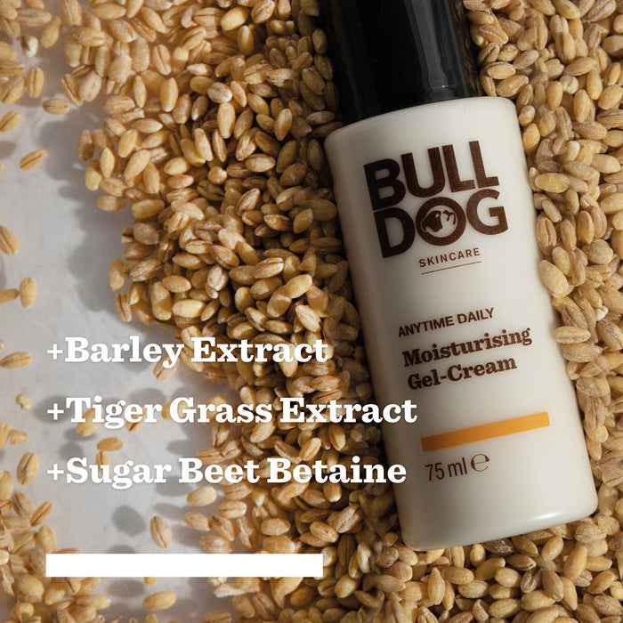 The Anytime Daily Collection Bundle rests on a bed of barley grains, featuring text that highlights its natural origin ingredients: Barley Extract, Tiger Grass Extract, and Sugar Beet Betaine.