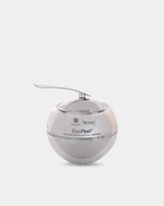 Silver spherical shaped skincare jar for the heaven bee peel on a white background.