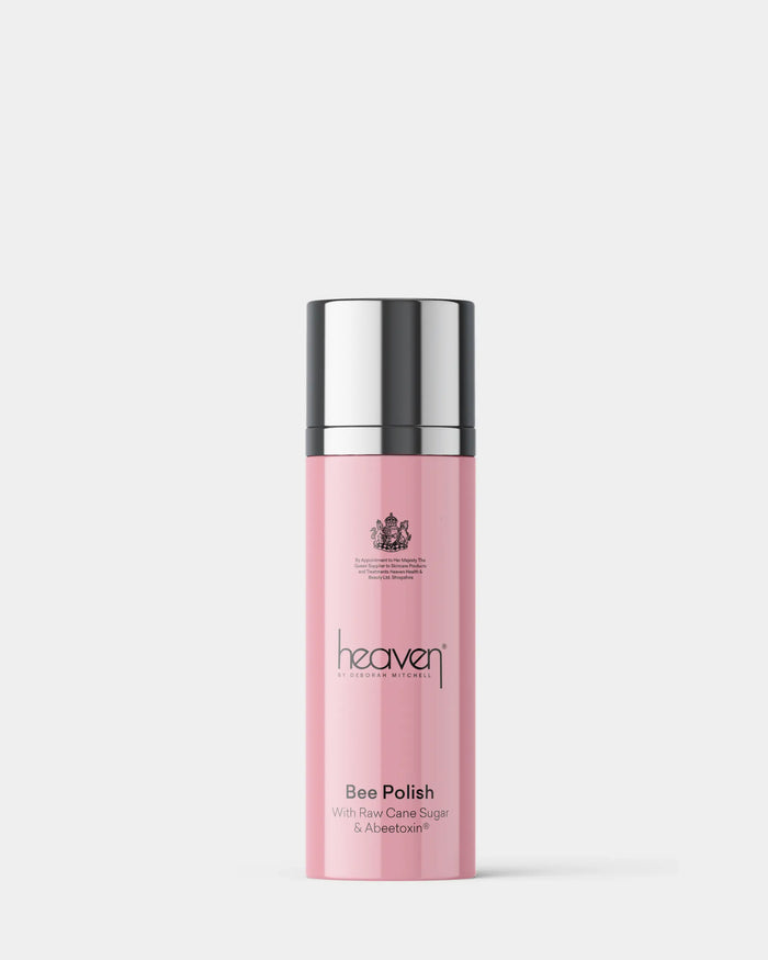 Pink bottle with silver cap on a white background