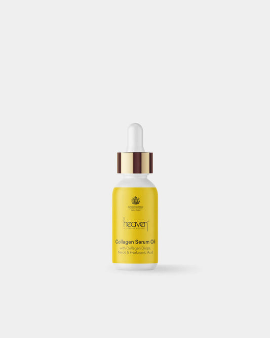 Yellow Collagen Serum Oil in pipette bottle. On a white background.
