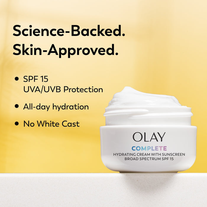 Olay Complete Cream Moisturizer with SPF 15 Normal container with lid off. Science backed. Skin approved. SPF15 UVA/UVB protection. All day hydration. No white cast.