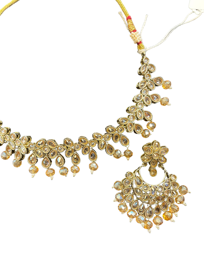 Crystal / Neutral - Medium Size Antique Gold Finish Necklace Set with Earrings & Head Piece - KAJ1016 03KK26