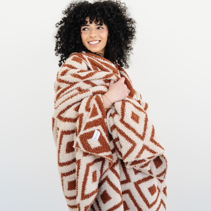 Woman wrapped in Khmer double layer bamboni throw blanket.