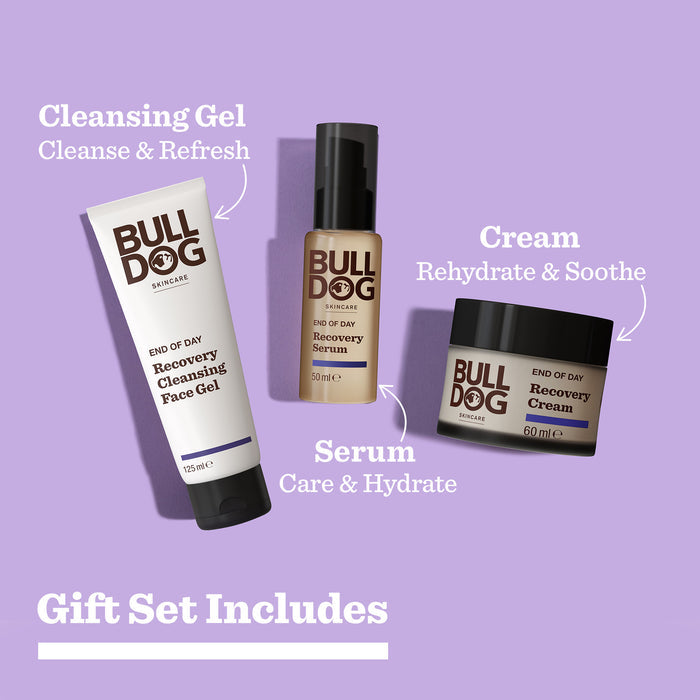 The End of Day Recovery Trio for men, shown on a purple background, includes cleansing gel, recovery serum, and cream with natural origin ingredients to cleanse, refresh, care for, hydrate, and soothe skin.