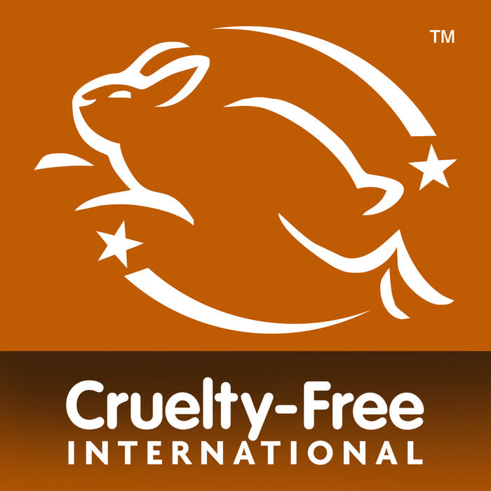 A white outline of a leaping rabbit with stars, symbolizing cruelty-free products like the Energising Collection Bundle, appears above the text Cruelty-Free International on an orange background.