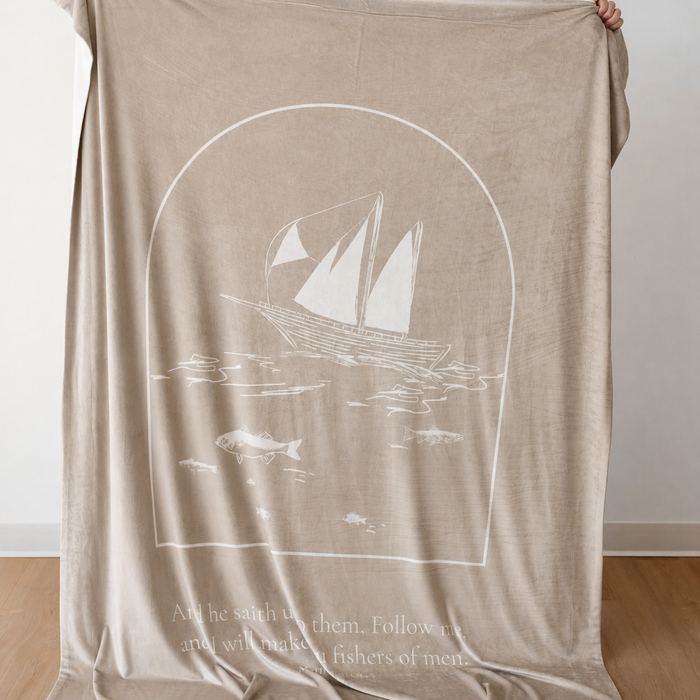 Cobblestone Christian blanket featuring the Fishers of Men design and Matthew 4:19 scripture, displayed to showcase the full sailboat artwork.