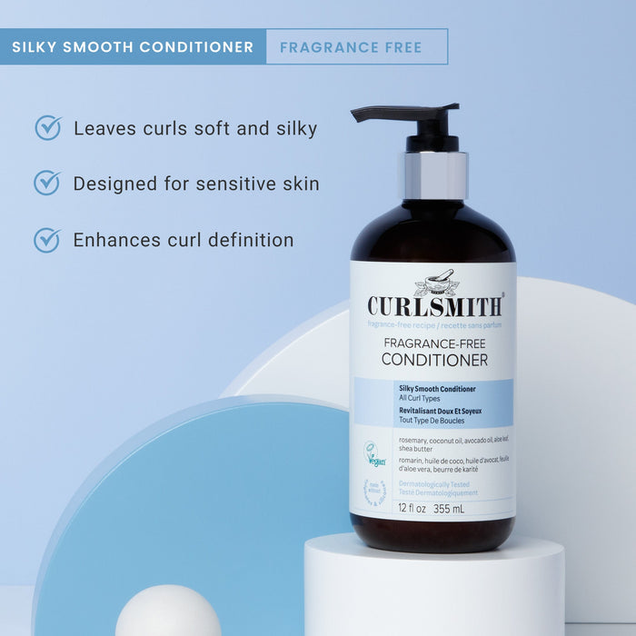 Curlsmith fragrance-free conditioner bottle on a light blue background with product features listed.