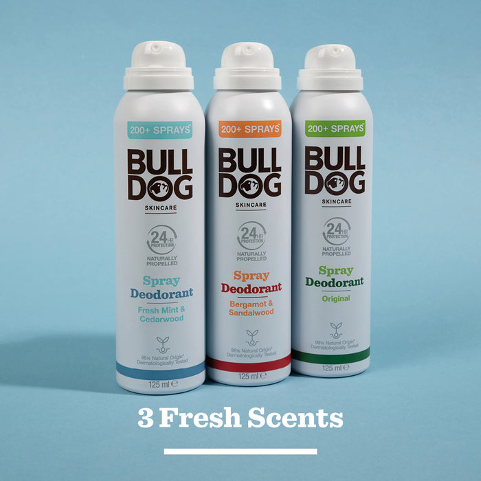 Three Bulldog spray deodorants stand side by side, each with a unique scent—Fresh Mint & Cedarwood, Bergamot & Sandalwood, and Original—all made with natural origin ingredients. Text below reads: 3 Fresh Scents.