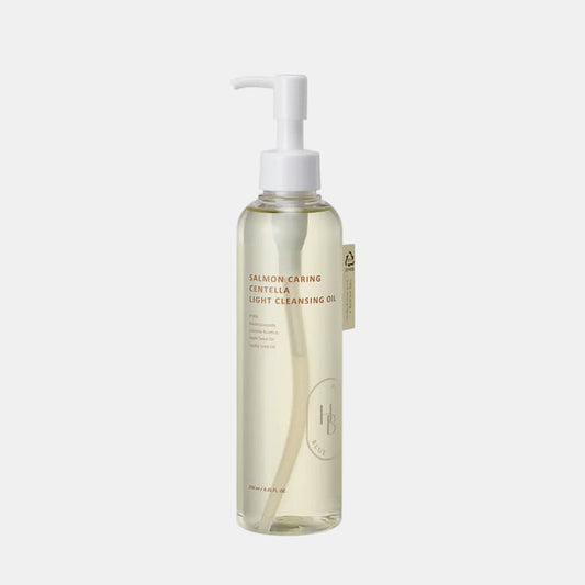 HEVEBLUE Salmon Caring Centella Light Cleansing Oil 240mL is a gentle Korean lightweight facial cleanser designed to remove makeup, blackheads, and excess sebum. Formulated to be non-greasy and suitable for all skin types—including sensitive skin—it emulsifies quickly with water for a clean finish without tightness.