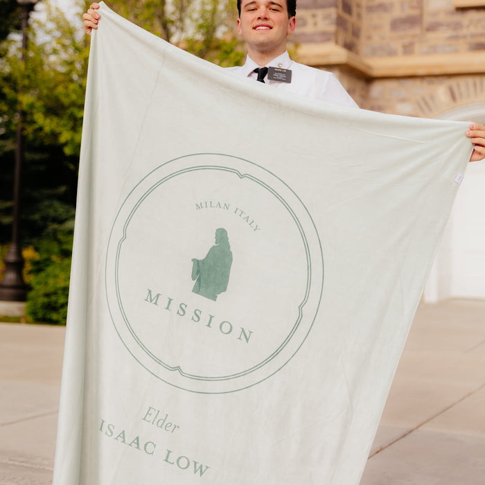 Personalized LDS missionary blanket featuring the In His Service design, custom missionary details, and faith-centered artwork.