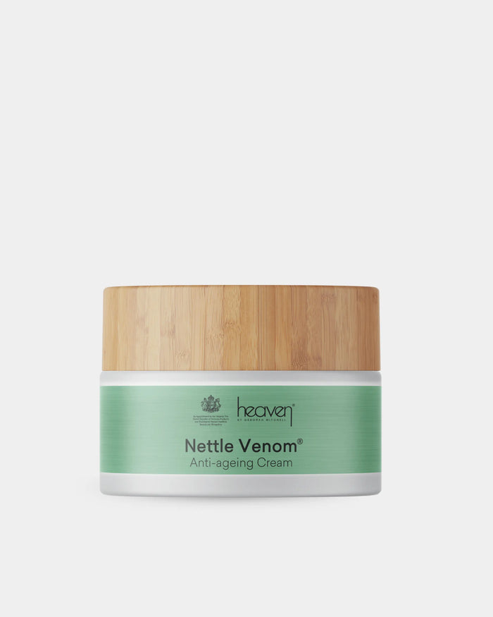 Nettle Venom anti-aging cream jar with wooden lid on a white background