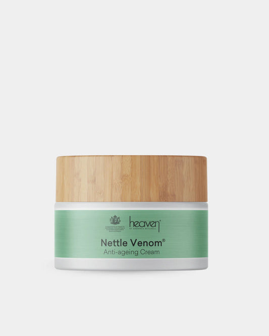 Nettle Venom anti-aging cream jar with wooden lid on a white background
