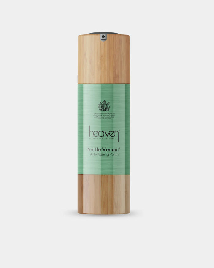 Skincare bottle with wooden cap and green label on a white background