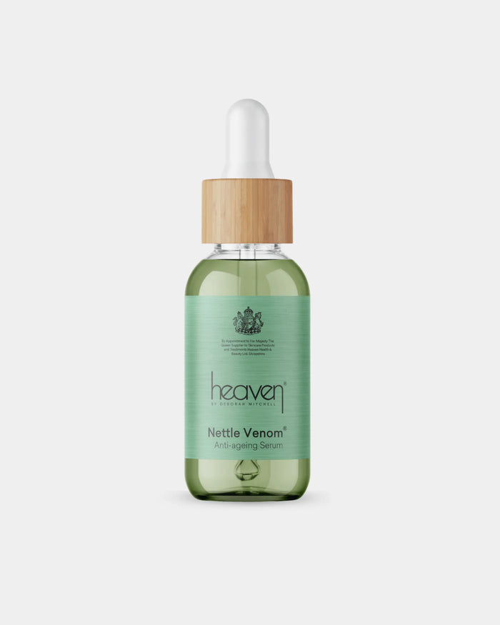 Nettle serum bottle with dropper labeled on a white background