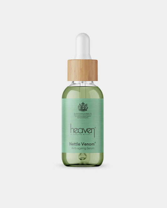Nettle serum bottle with dropper labeled on a white background