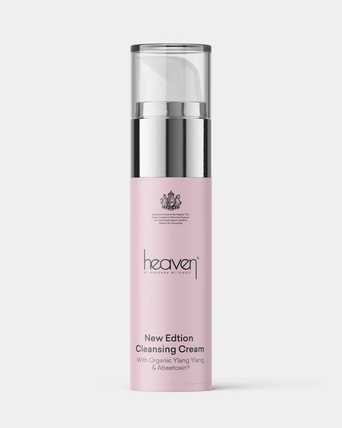 Pink skincare bottle with silver cap on a white background