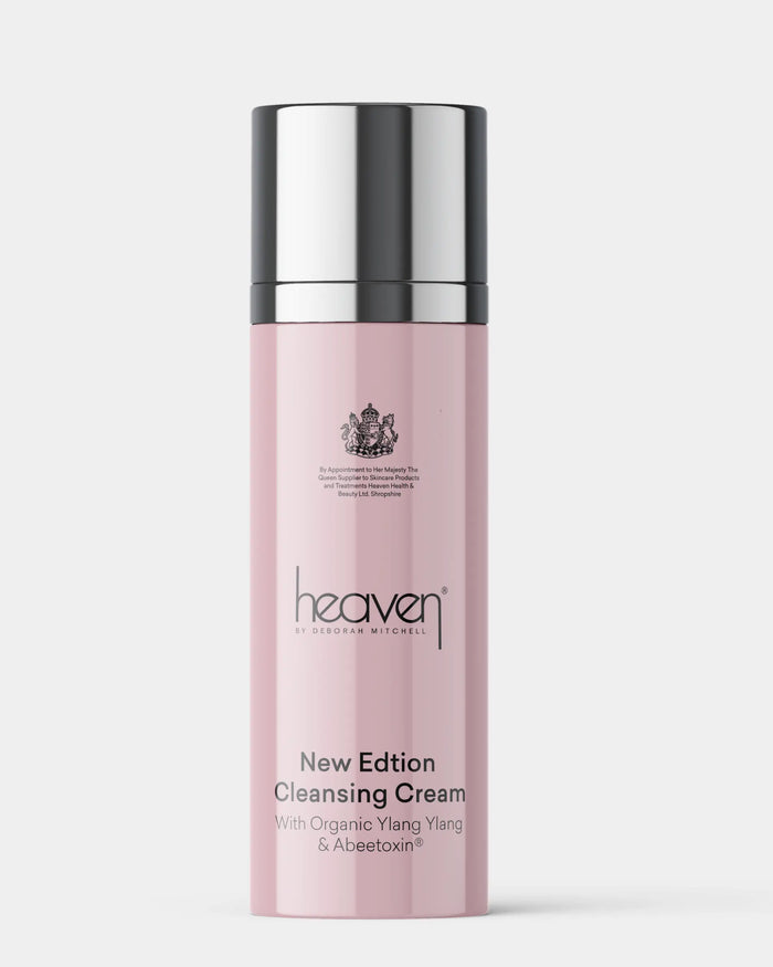 Pink skincare bottle with silver cap on a white background