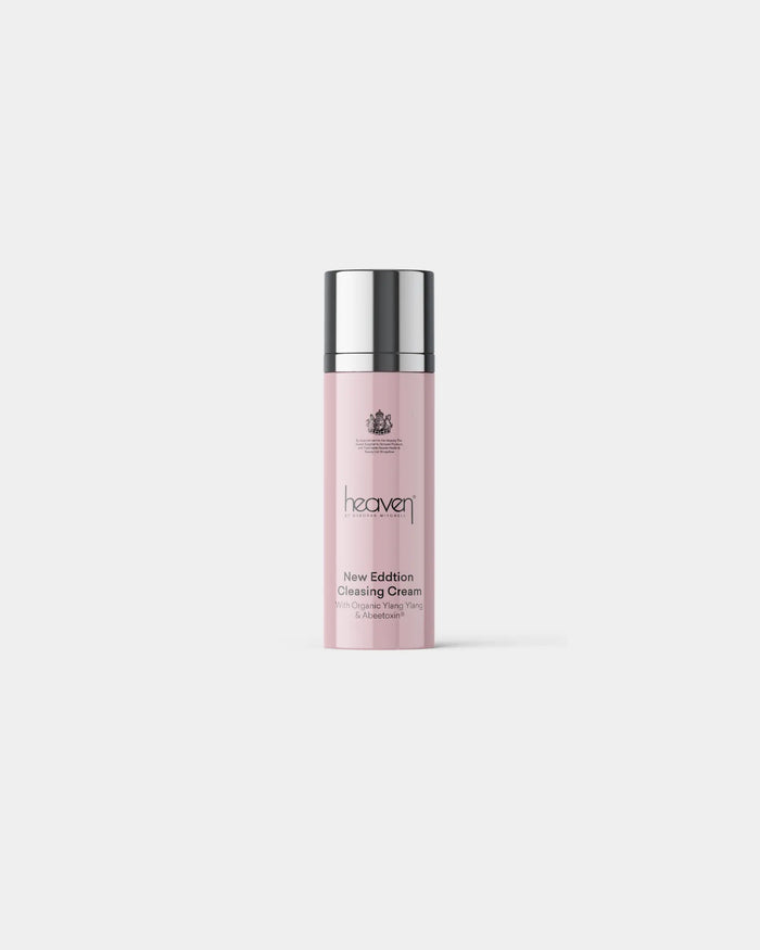 Pink bottle of heaven cleansing cream on a white background
