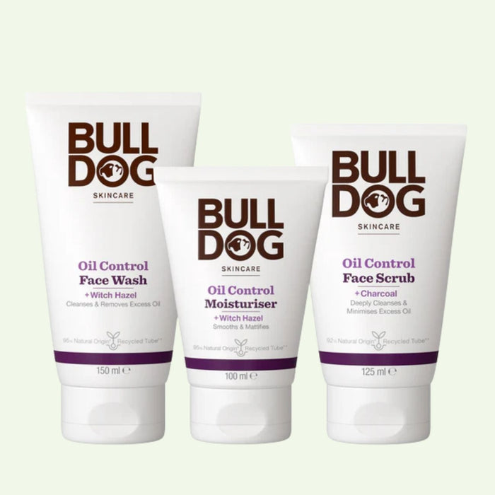 The Oil Control Skincare Bundle for oily skin includes Face Wash, Moisturiser, and Face Scrub with witch hazel, each in white tubes with black and purple text, displayed upright against a light background.