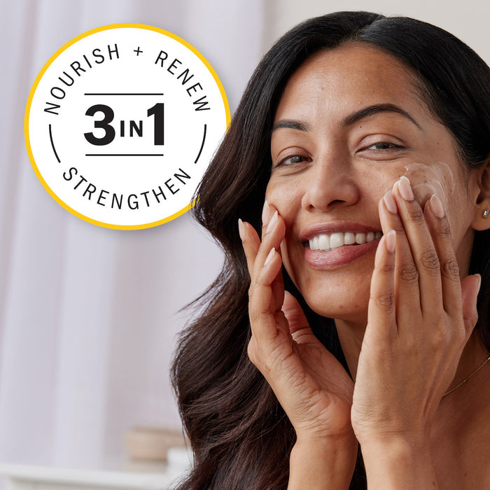 Model applying moisturizer cream to face. 3 in 1 Nourish, renew, strengthen.
