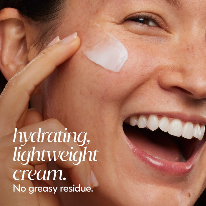 Model posing, smiling applying Olay Retinol 24 MAX Night Moisturizer cream to face. Hydrating, lightweight cream. No greasy residue.