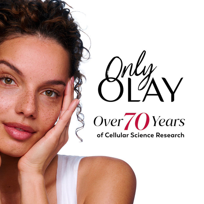 Model posing with hand on face. Only Olay. Over 70 years of cellular science research.