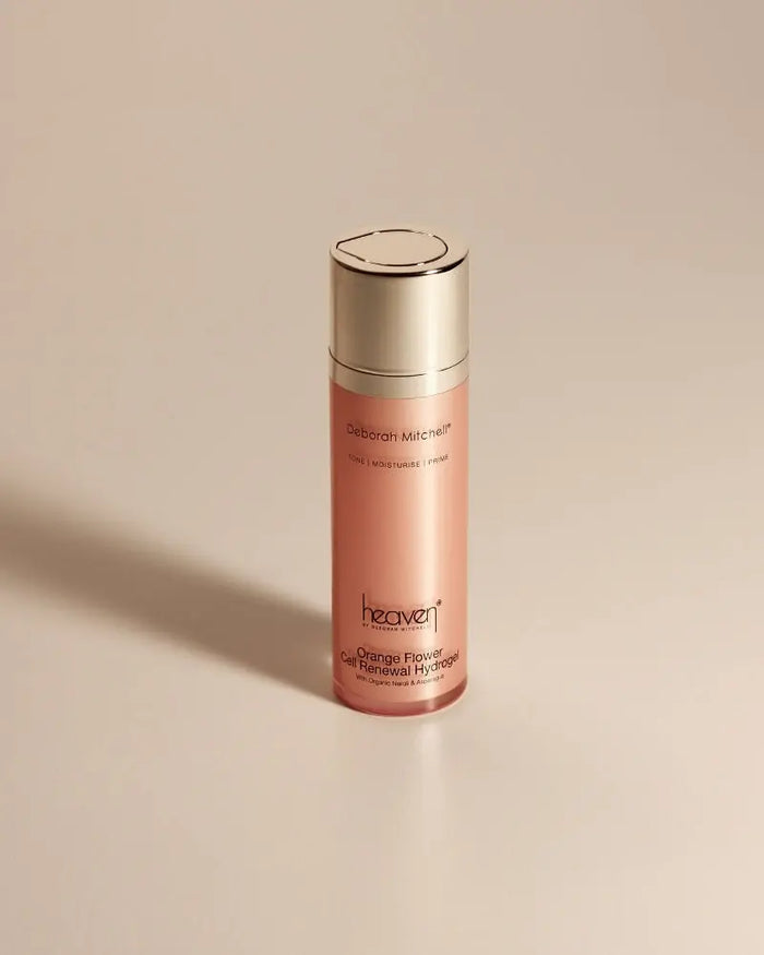 Small orange flower cell renewal hydrogel on beige background.