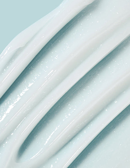 Close-up of light blue skincare cream texture