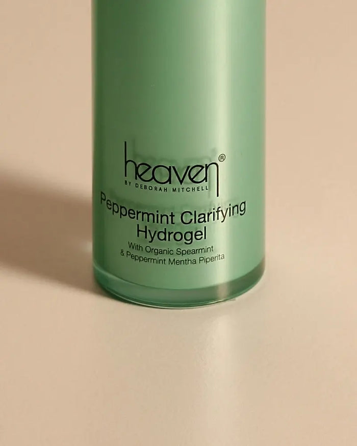 Close up of green peppermint clarifying hydrogel. On beige background.