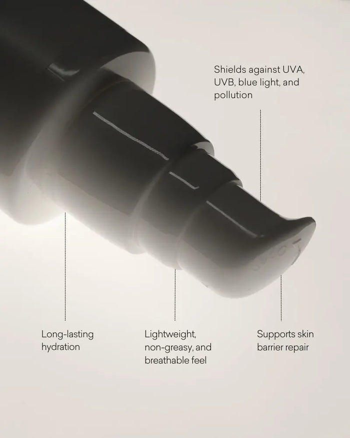 Close-up of a skincare product with text highlighting its features on a light gray background