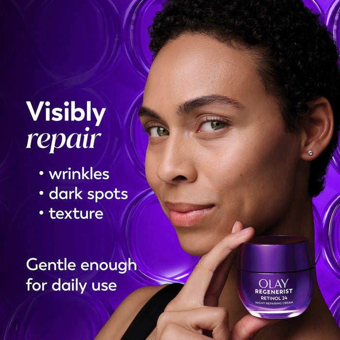 Model posing holding Olay Retinol24 Night Moisturizer jar. Visibly repair wrinkles, dark spots, texture. Gentle enough for daily use