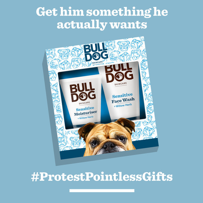 A gift box of Bulldog Skincare's Sensitive Duo Set is shown with a bulldog illustration, “Get him something he actually wants” above, and “#ProtestPointlessGifts” below, all on a blue background.