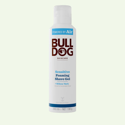 A white can of Sensitive Foaming Shave Gel with blue and brown text, featuring the Bulldog logo and details about willow herb, baobab oil, and natural origin ingredients for sensitive skin.