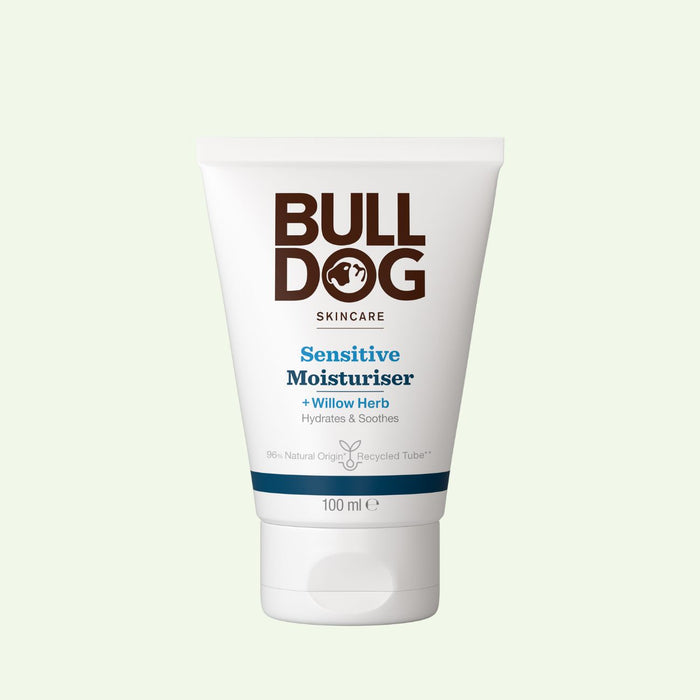 A white tube of Sensitive Moisturiser with Willow Herb, designed to hydrate and soothe sensitive skin. Made with natural origin ingredients, the 100 ml tube stands upright against a pale background.