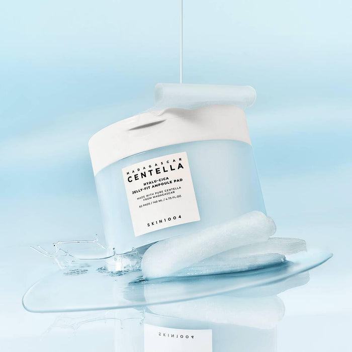 SKIN1004 Madagascar Centella Hyalu-Cica Jelly-Fit Ampoule Pad (60ea) is a 140ml container of pre-soaked, hydrogel-like toner pads designed to provide deep hydration, immediate cooling, and gentle exfoliation. These pads are particularly effective for dry, dehydrated, or stressed skin.