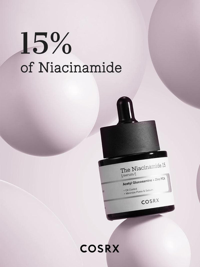 COSRX The Niacinamide 15 Serum displayed with text ‘15% of Niacinamide’, emphasizing its high concentration formula to target excess sebum, large pores, and uneven skin tone; suitable for for oily, acne-prone skin looking to even out skin tone.