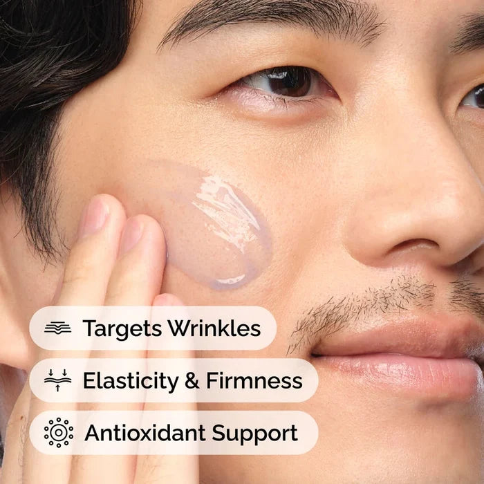 Close-up of a man applying cream to his face with text highlighting benefits.