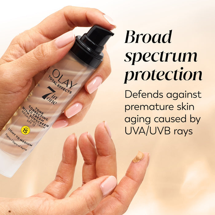 Total Effects 7 In One CC Tone Correcting Moisturizer SPF 15 applying cream to finger. Broad spectrum protection. Defends against premature skin aging caused by UVA/UVB rays.
