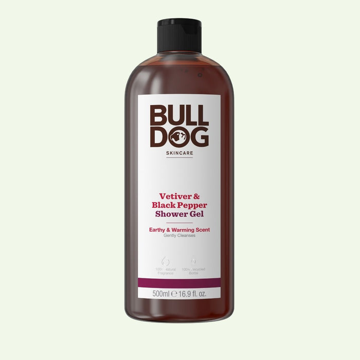 A 500ml bottle of Vetiver & Black Pepper Shower Gel for men, featuring a natural earthy fragrance. The black-capped bottle displays white and maroon text on a white label.